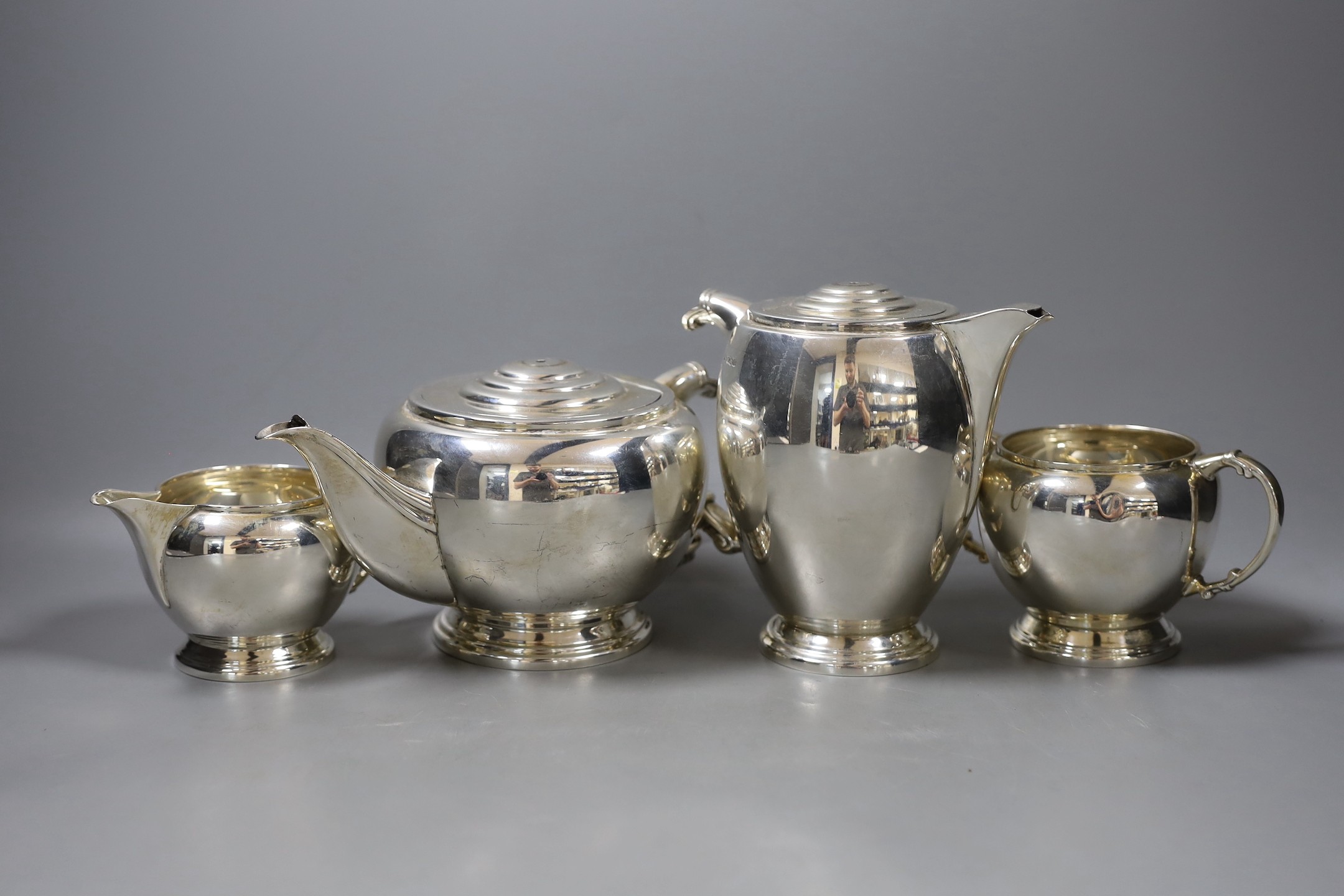 A George VI silver four piece ovoid tea set, by Frank Cobb Ltd, Sheffield, 1945, gross weight 59oz, no handles or knops.